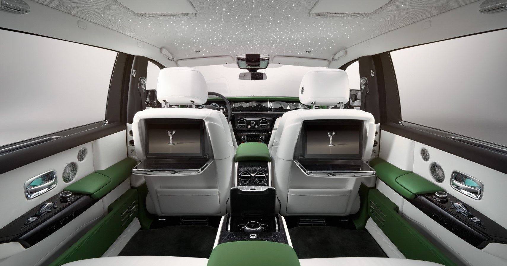 Land Rover Defender 110 green SUV at ZoomMoto showroom